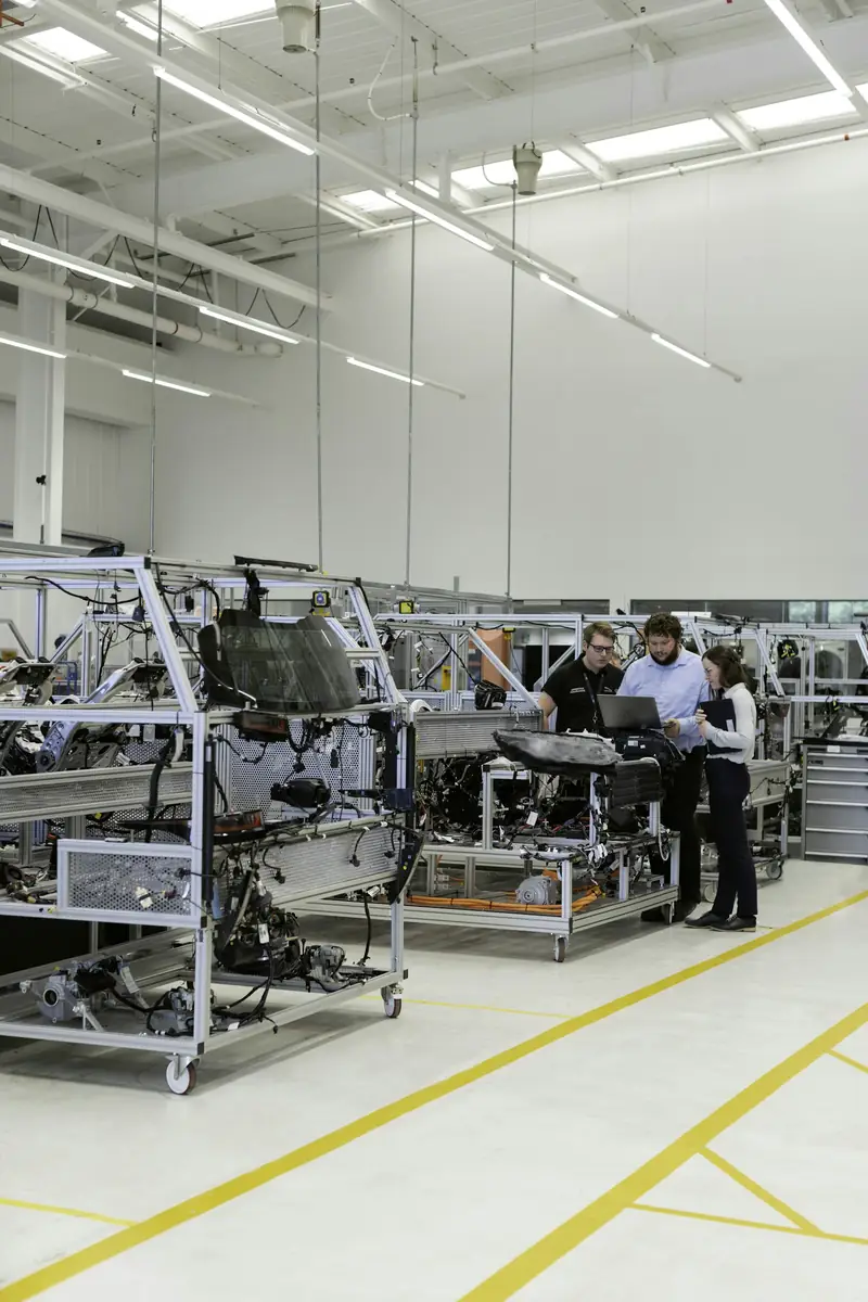 Engineers working inside a manufacturing plant